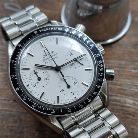 omega speedmaster reduced white|Omega Speedmaster reduced meaning.